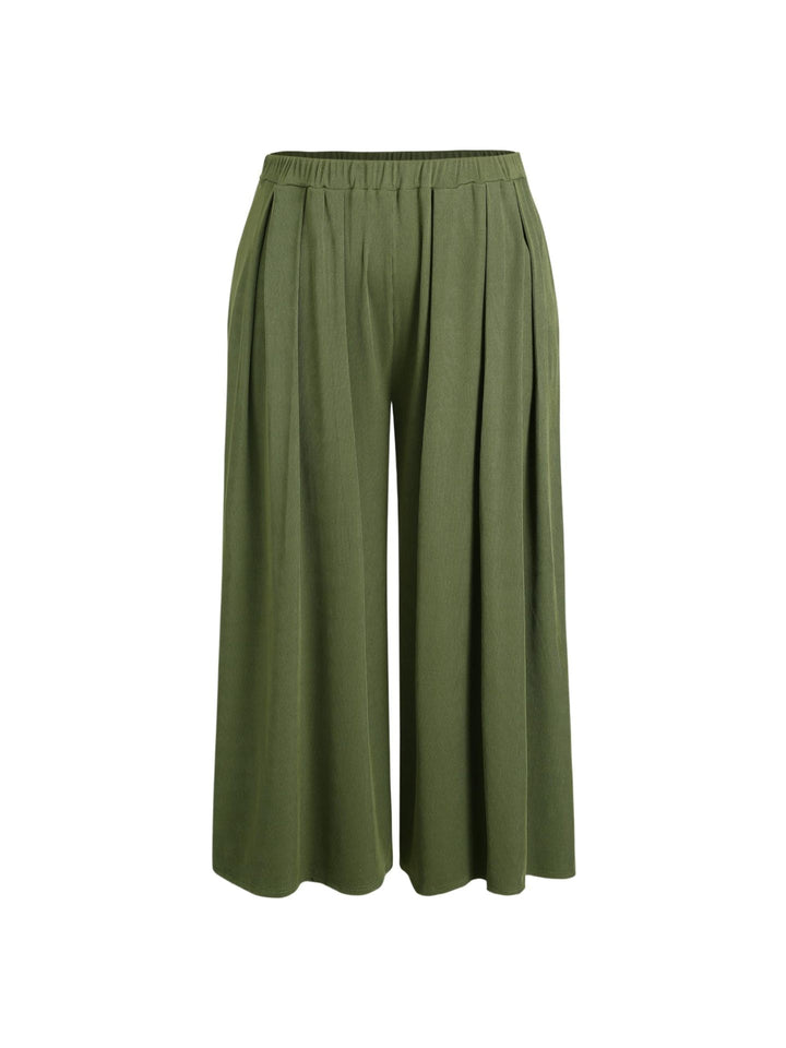 Grüne Palazzohose für Damen mit extra hohem, komfortablem Gummibund und weitem Bein für optimalen Tragekomfort.