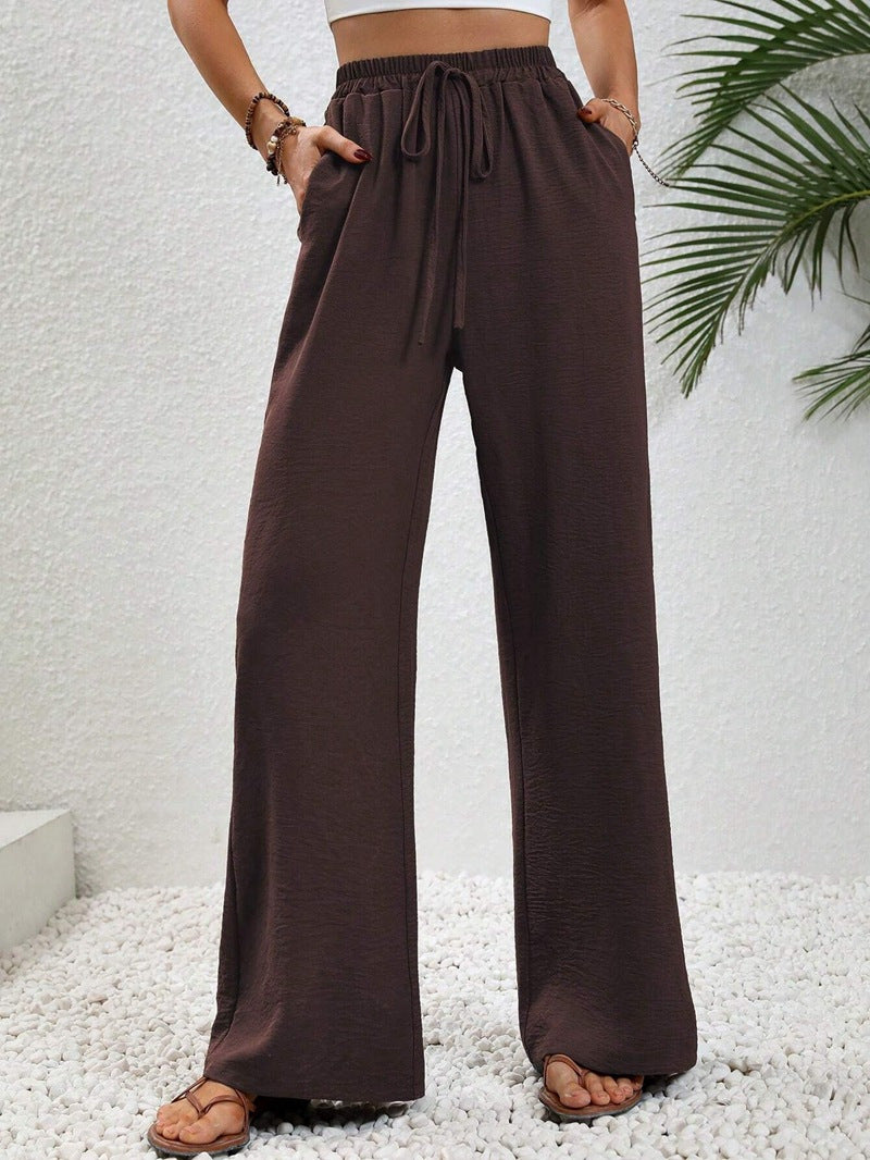 Stylische Palazzohose für Damen, leichter Stoff, mit weitem Bein und Gummizug.