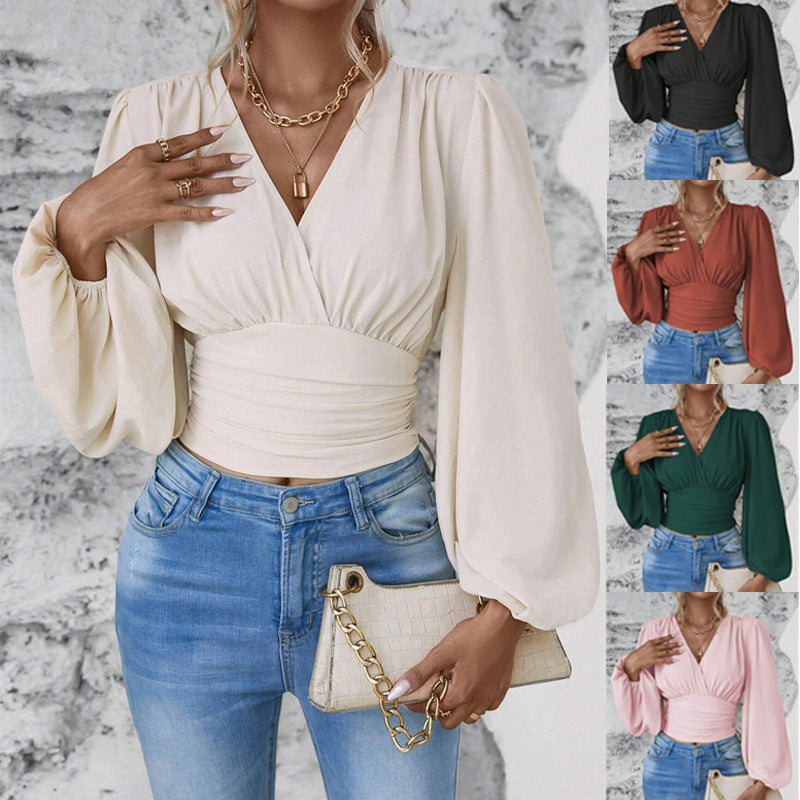 Damen Wickel-Cropped-Top mit eleganten Ballonärmeln und geraffter Taille, schmeichelhafter V-Ausschnitt.