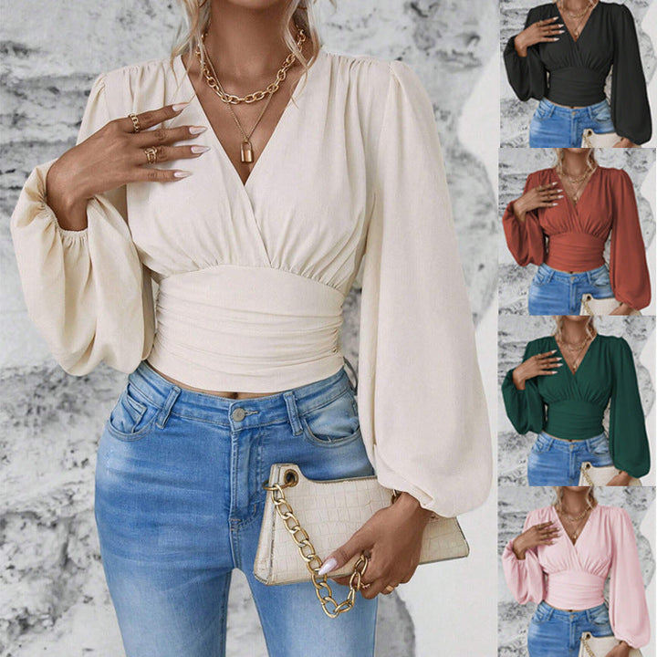 Damen Wickel-Cropped-Top mit eleganten Ballonärmeln und geraffter Taille, schmeichelhafter V-Ausschnitt.
