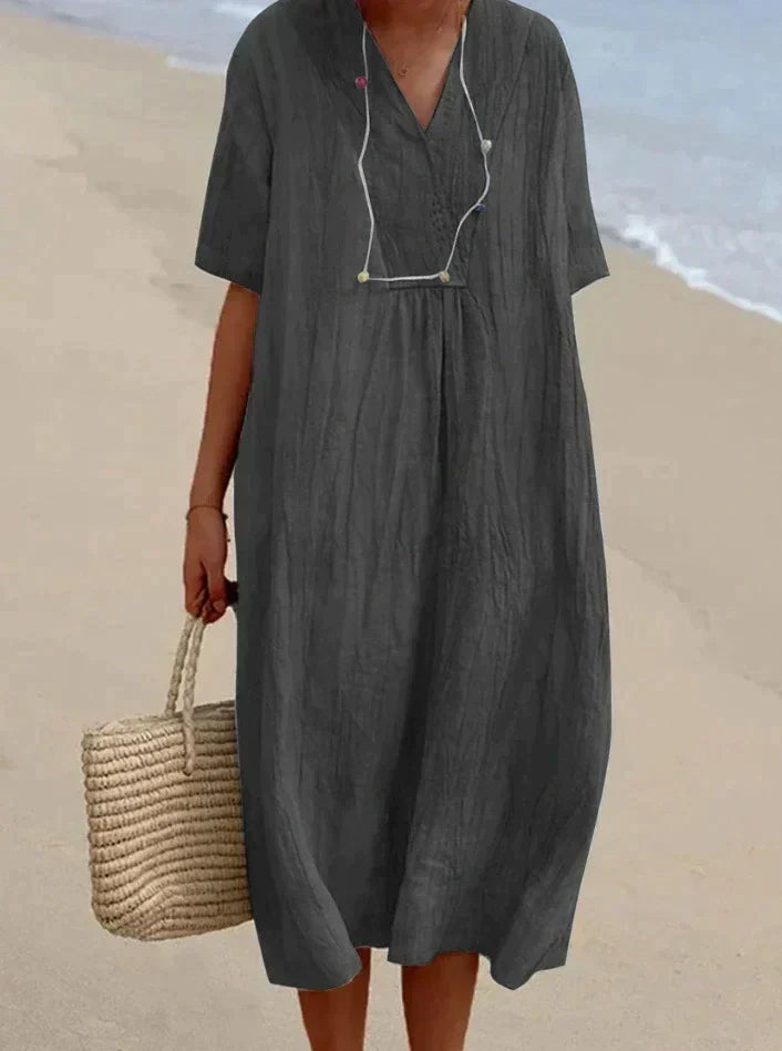 Atmungsaktives Baumwoll-Leinen Sommerkleid Aria mit V-Ausschnitt & A-Linie für heiße Tage.