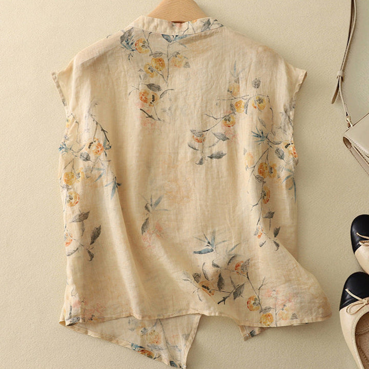 Vielseitige Kurzarmbluse für Damen mit bequemem Stehkragen und elegantem floralen Print, perfekt für warme Tage.
