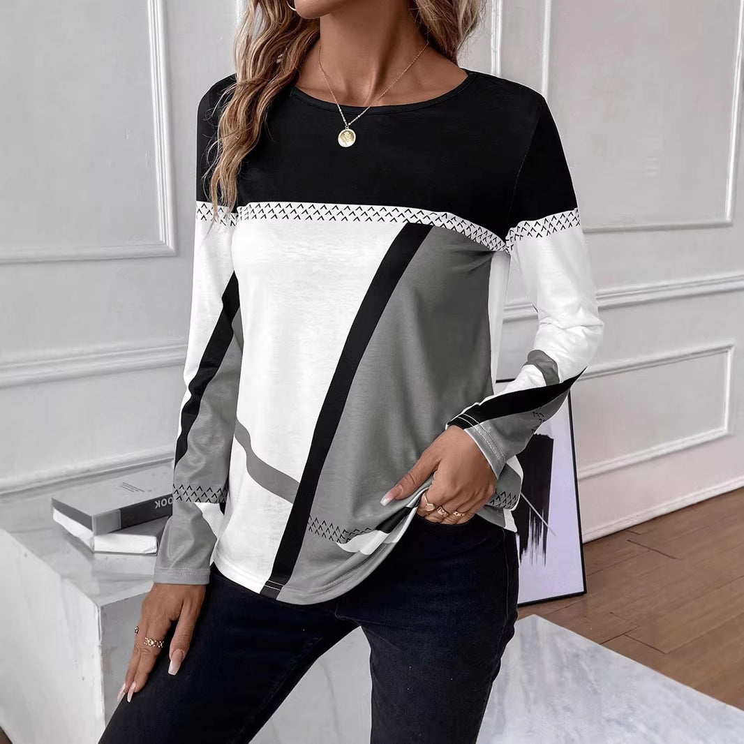 Bequemes Damen Langarmshirt, geometrischer Blockprint, Rundhals. Ideal für entspannte Tage.
