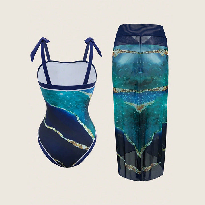 Grüner Damen Einteiler Badeanzug, elegant, mit passendem transparentem Wickelrock. Ideal für Sommermode.