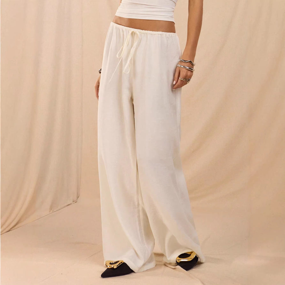 Bequeme weite Damen-Freizeithose in Leinenoptik mit hohem Elastikbund und Kordelzug.