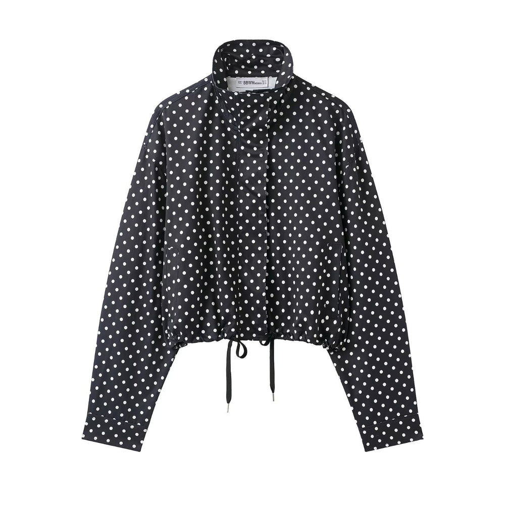 Wasserdichte Damen Windjacke in elegantem Punktedesign. Perfekt für Freizeit & Outdoor-Aktivitäten.
