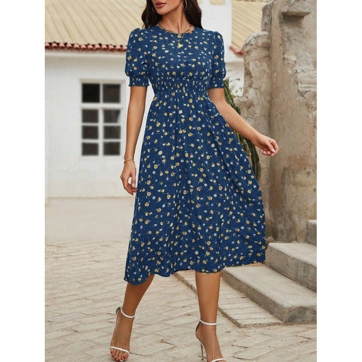 Damen Maxikleid im Boho-Stil, Blumendruck, Smock-Taille & Puffärmel. Ideal für Frühling und Sommer.
