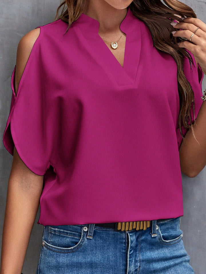 Trendige Damen Carmenbluse, schulterfrei, mit V-Ausschnitt und Stehkragen. Eine elegante Wahl.