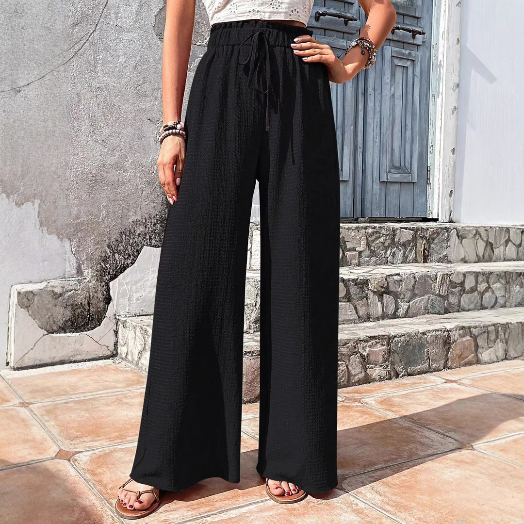 Weit geschnittene Damen-Sommerhose, Palazzostil, mit elastischem Bund & Kordelzug. Leichter Stoff für hohen Komfort.