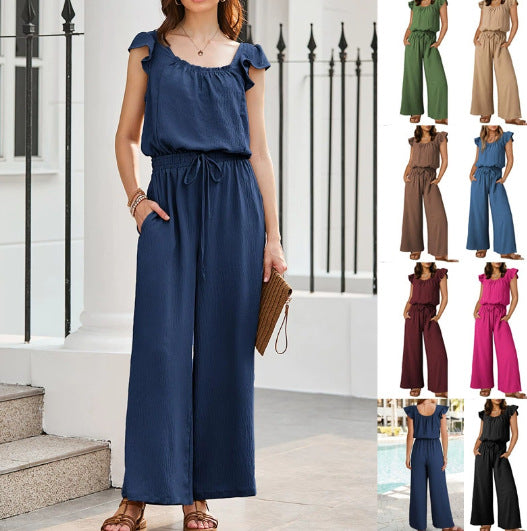 Schwarzer Damen Crinkle-Overall mit weitem Bein & Rüschenärmeln, elegant für entspannte Sommerlooks.