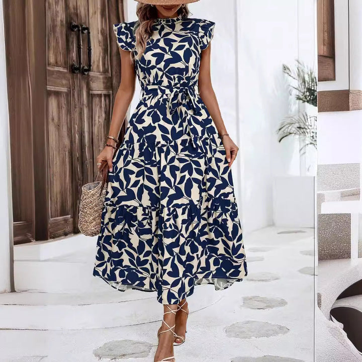 Florales Damen Midikleid mit Blumenmuster, Stufenrock und verspielten Rüschenärmeln für einen stilvollen Auftritt.