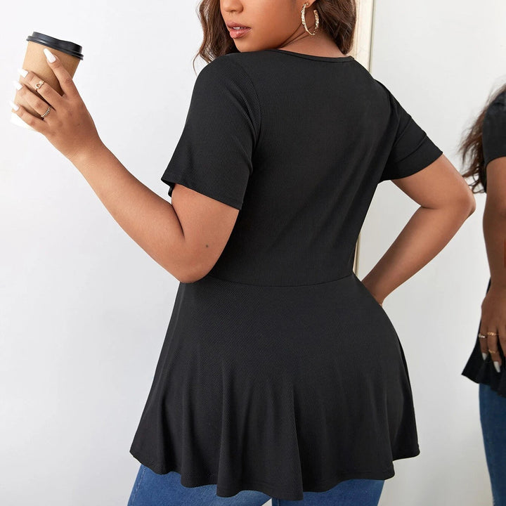 Figurbetonendes Damen Peplum-Top, V-Ausschnitt, Reißverschluss. Betont die Taille elegant für einen schicken Look.