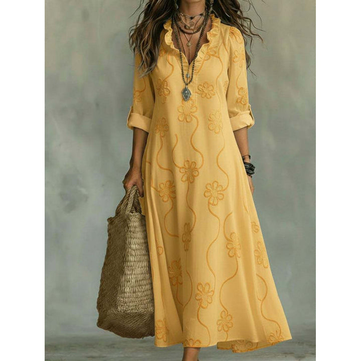 Boho Maxikleid für Damen am Strand. Langes Sommerkleid mit Blumenmuster & V-Ausschnitt, ideal für den Urlaub.