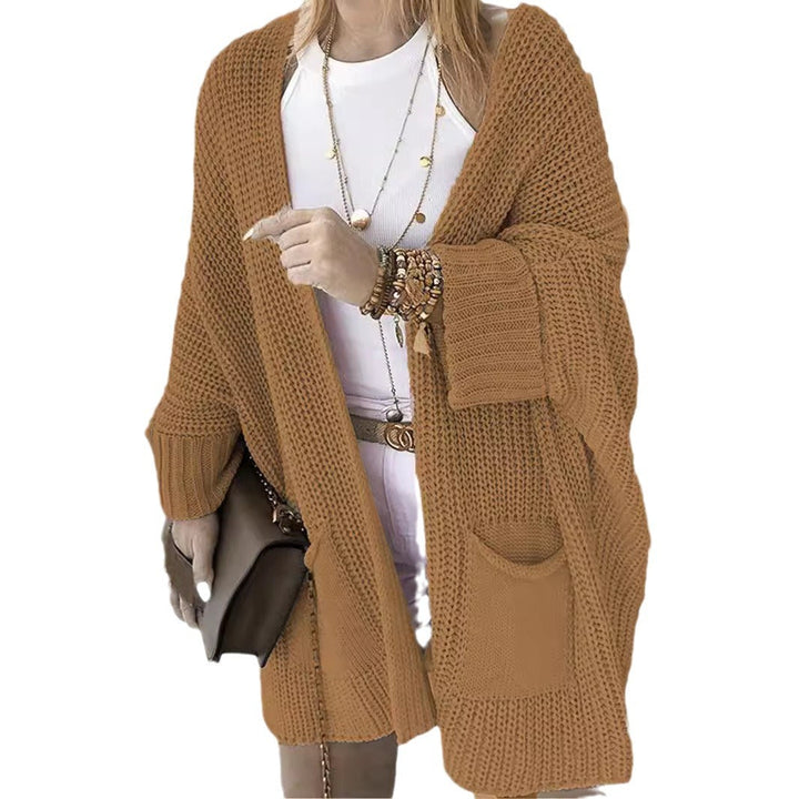 Weiche Damen Strickjacke im Grobstrick-Design, gemütlich und mit großen Taschen. Lässiger Look für Damen.