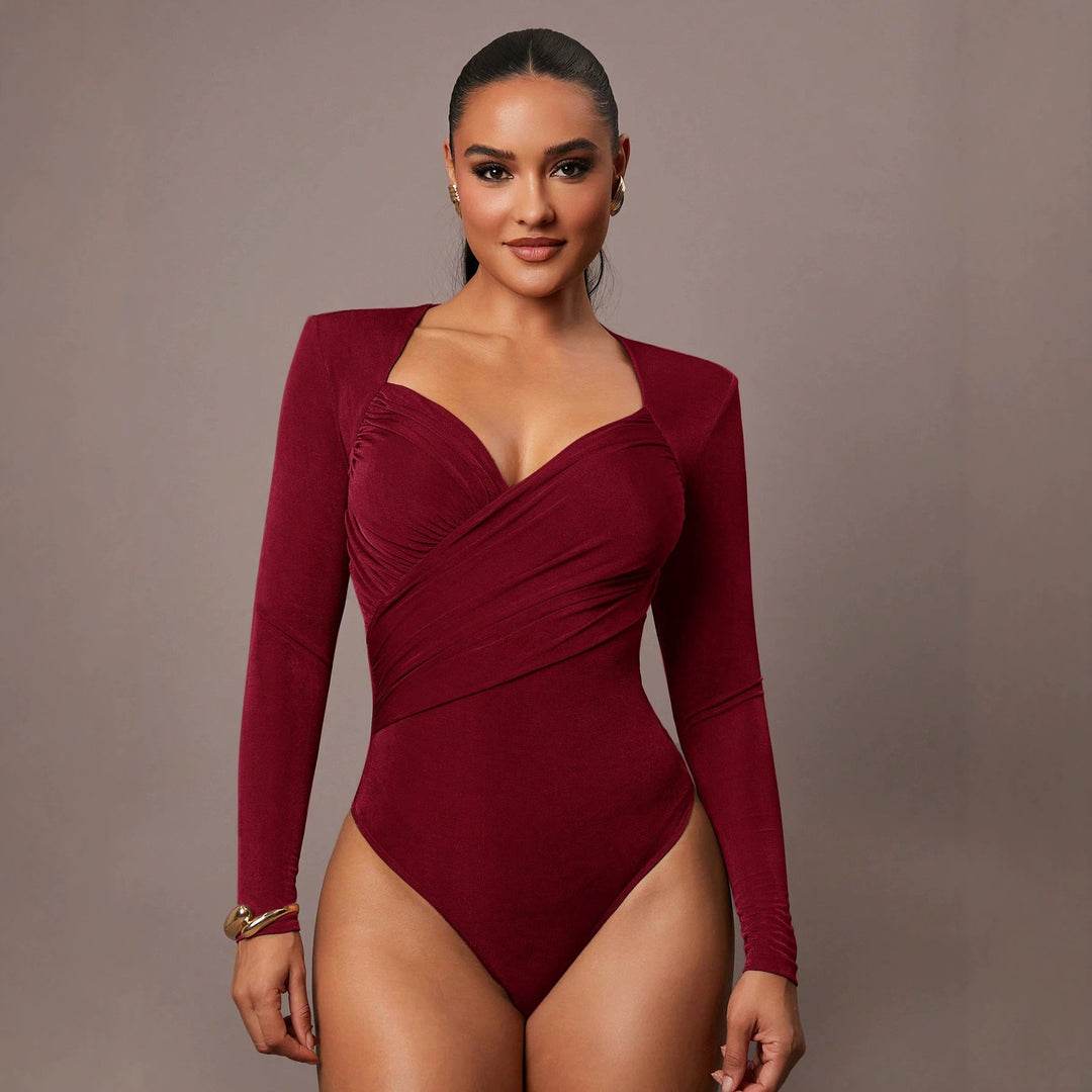 Modellierender Damen Formbody mit Herzausschnitt und Langarm. Unterstreicht die Silhouette elegant.