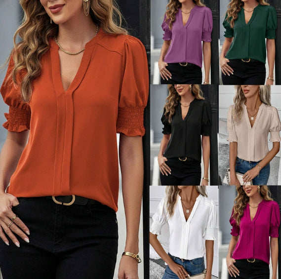 Damen elegante Bluse mit V-Ausschnitt & romantischen Puffärmeln. Ideal für Business Casual & feminine Looks.