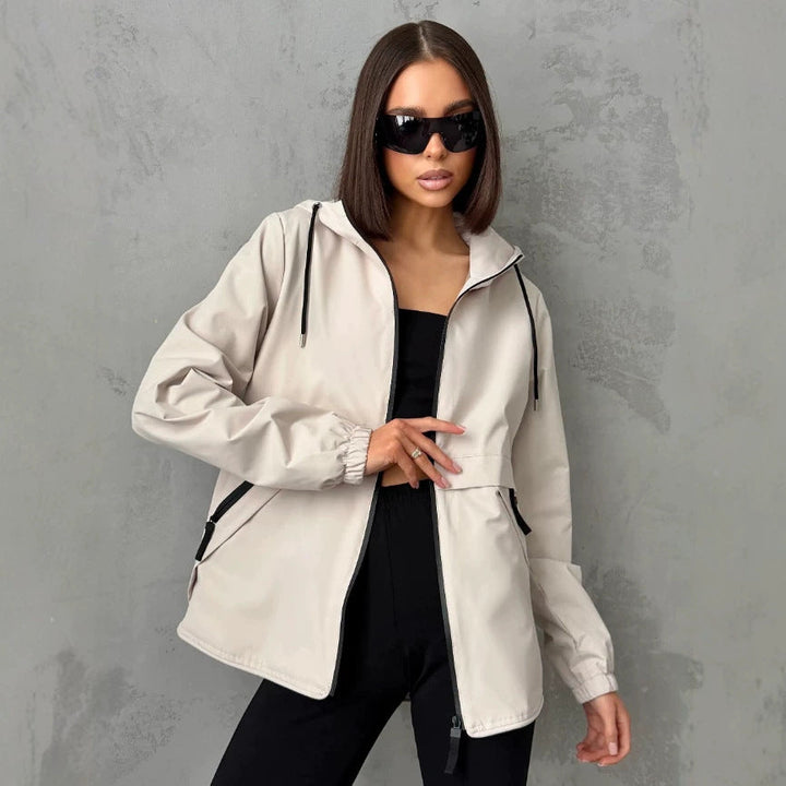Leichte Damen Windbreaker Jacke mit Kapuze, winddicht. Ideal für Outdoor, Sport & Freizeit.