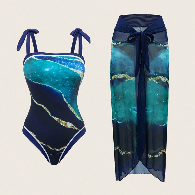 Eleganter Damen Einteiler Badeanzug Set mit transparentem Wickelrock in Grün für Strand & Pool.