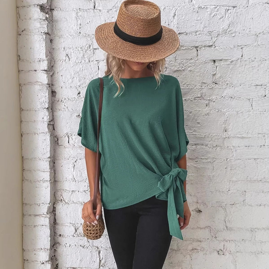 Trendiges Sommer Damen Oversize Top mit Kurzarm, Crinkle-Textur & eleganter Schleife. Ideal für warme Tage.