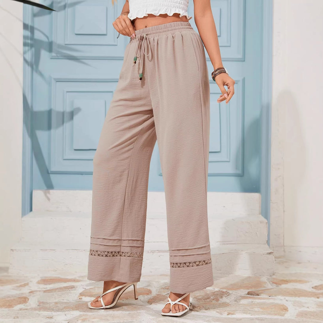 Moderne Boho Strandhose für Damen, weites Bein, hoher Bund, Bindekordel, detailreicher Spitzensaum.