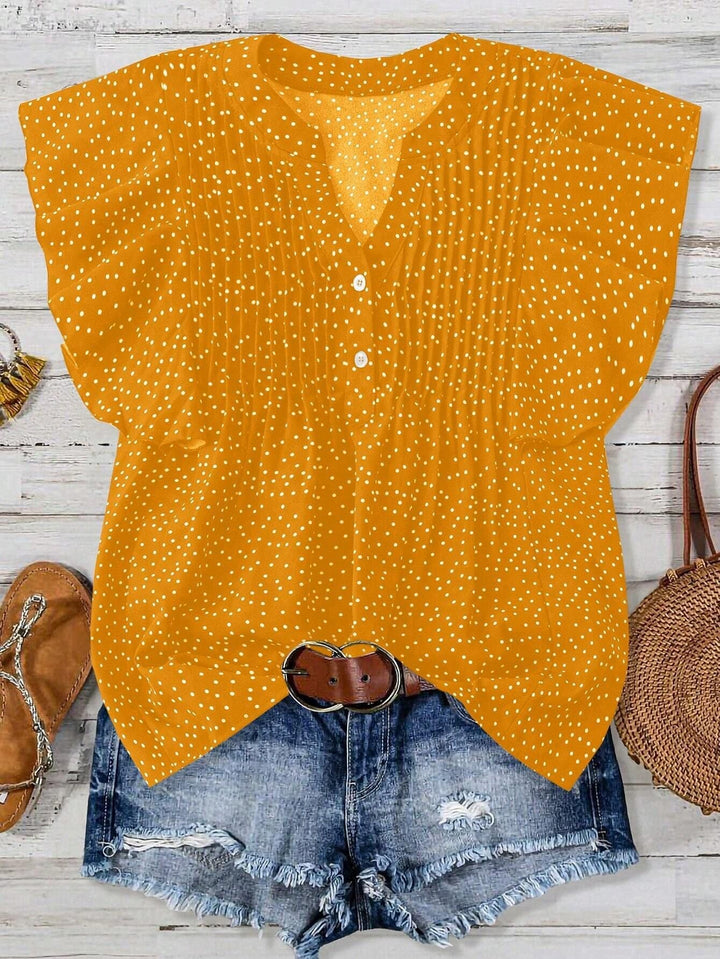Feminine Bluse mit Punkte Muster, V-Ausschnitt, Flügelärmeln und Kellerfalten, vielseitig tragbar.