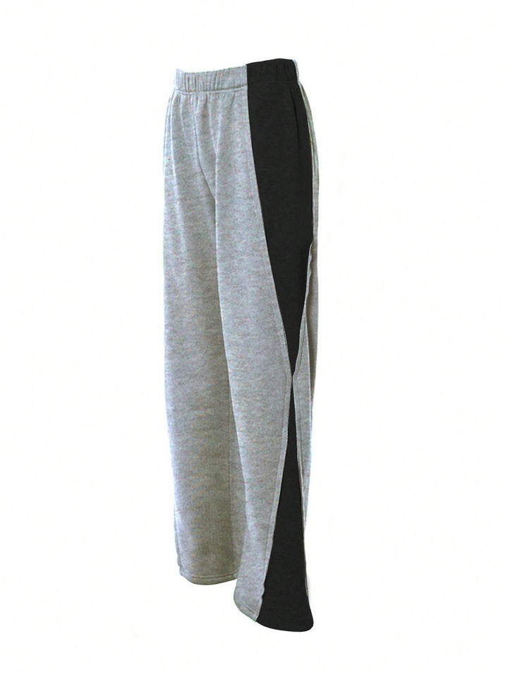 Vielseitige Damen Trainingshose mit lockerem Schnitt und stilvollem Kontrast-Detail.