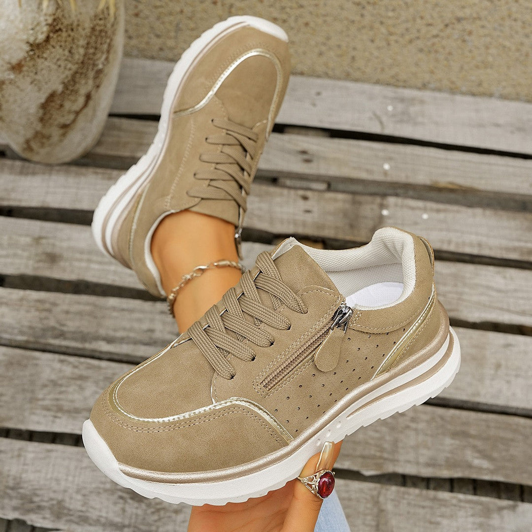 Komfortable Damenschuhe mit integrierter Fußgewölbestütze und dämpfender Sohle für lange Spaziergänge.