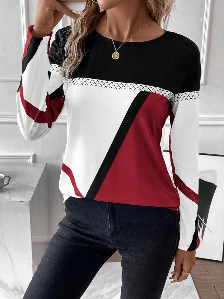 Lässiges Damen Langarmshirt mit geometrischem Blockprint und Rundhals für den Alltag.