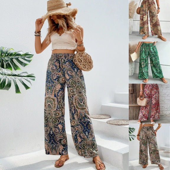 Elegante Damen Palazzo-Hose mit weitem Bein, bequemem Smockbund & modischem Paisley-Print. Perfekte Sommerhose.
