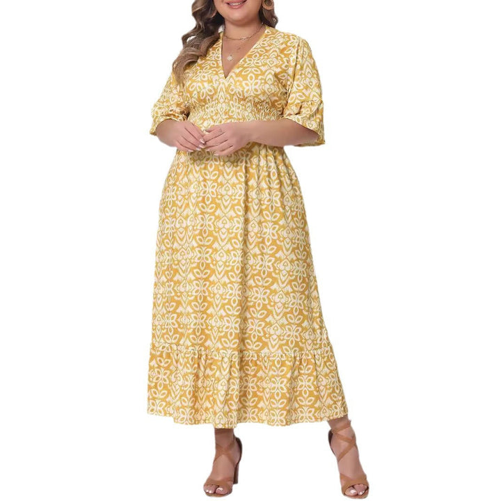 Elegantes Damenkleid in Midilänge, A-Linie, mit V-Ausschnitt und auffälligem Grafikprint. Festliches Kleid.