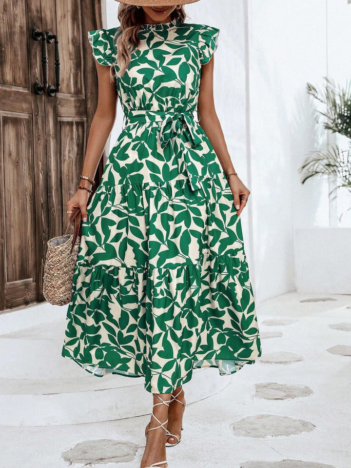 Trendiges Damen Midikleid: Blumenmuster, Stufenrock, Rüschenärmel. Ideal als Sommer- oder Freizeitkleid.