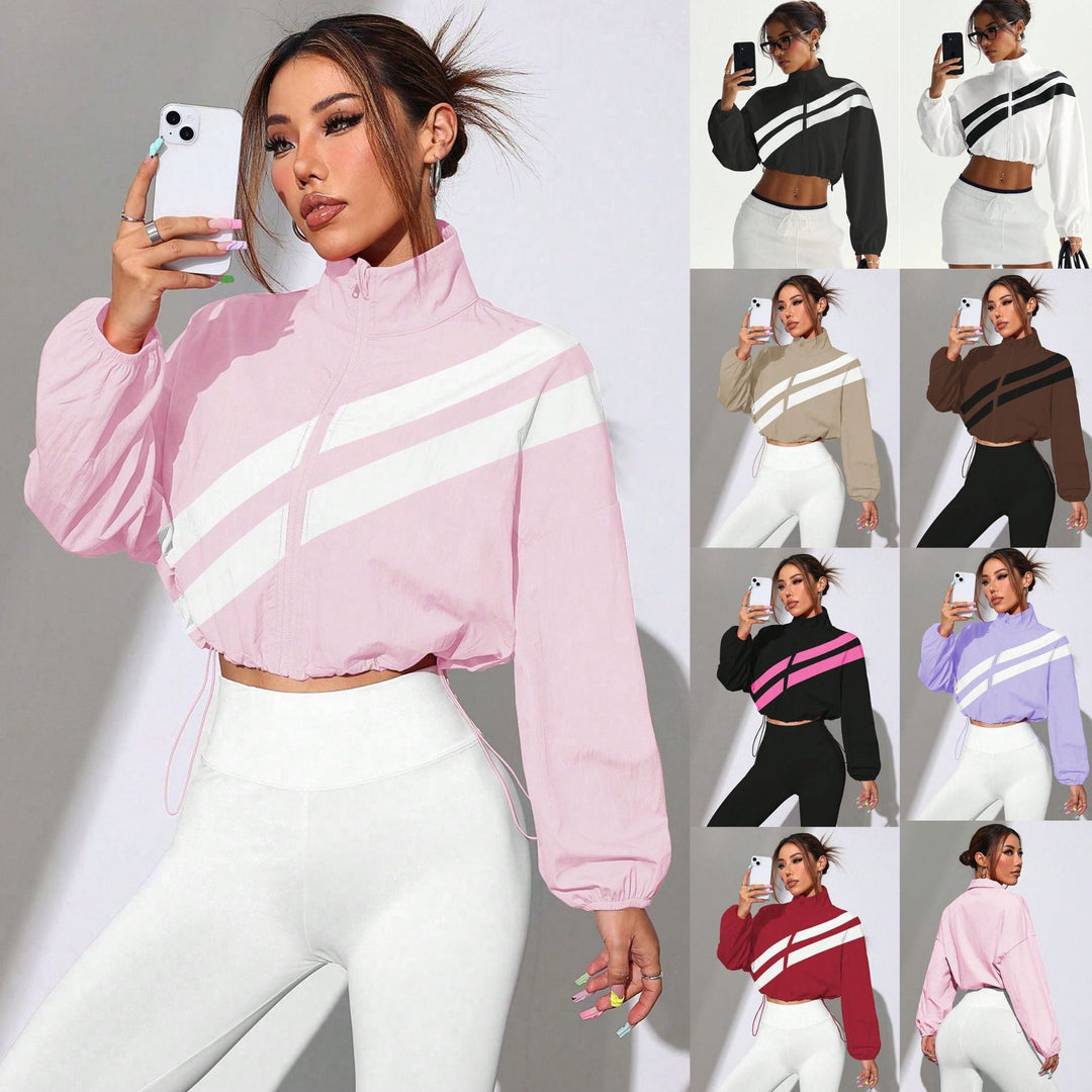 Damen Cropped Windbreaker-Jacke mit Stehkragen. Sportliche, windabweisende Übergangsjacke für Frauen.