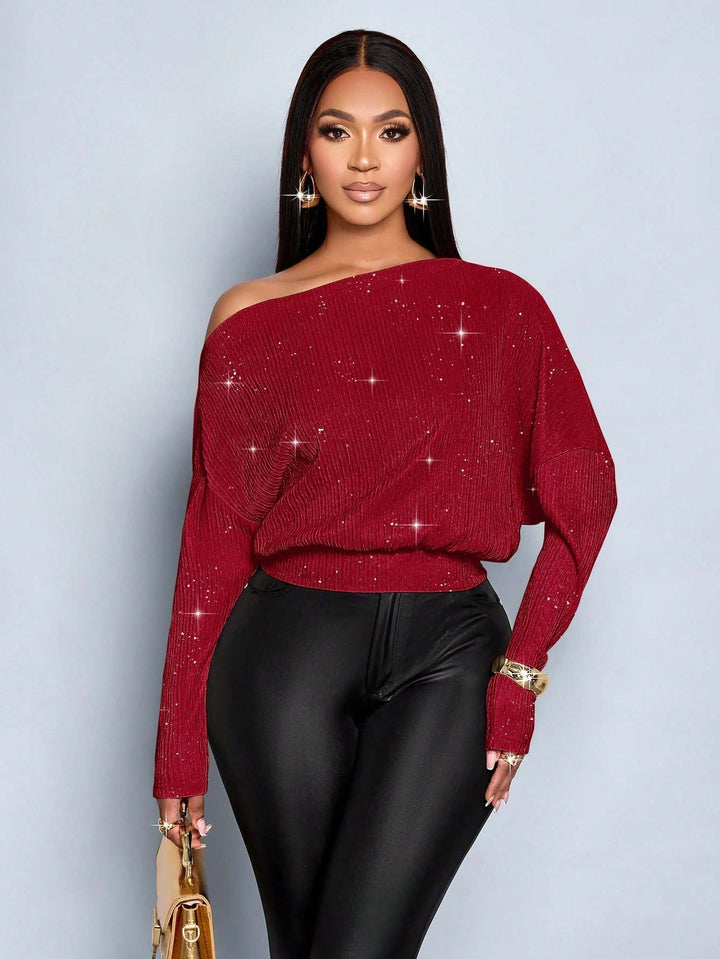 Funkelnder Damen Off-Shoulder Glitzerpullover, elegant und vielseitig.