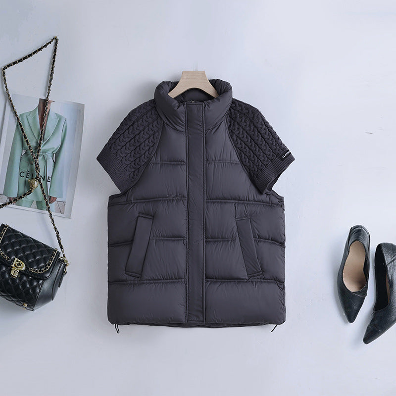 Kurze Damen Steppweste mit Stehkragen und Strickschultern in Schwarz, ideal für Herbst & Übergang.