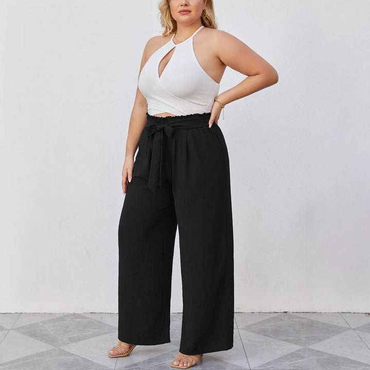 Hochwertige Damen Paperbag-Hose aus atmungsaktivem Stoff, weites Bein und hohe Taille, mit praktischen Taschen.