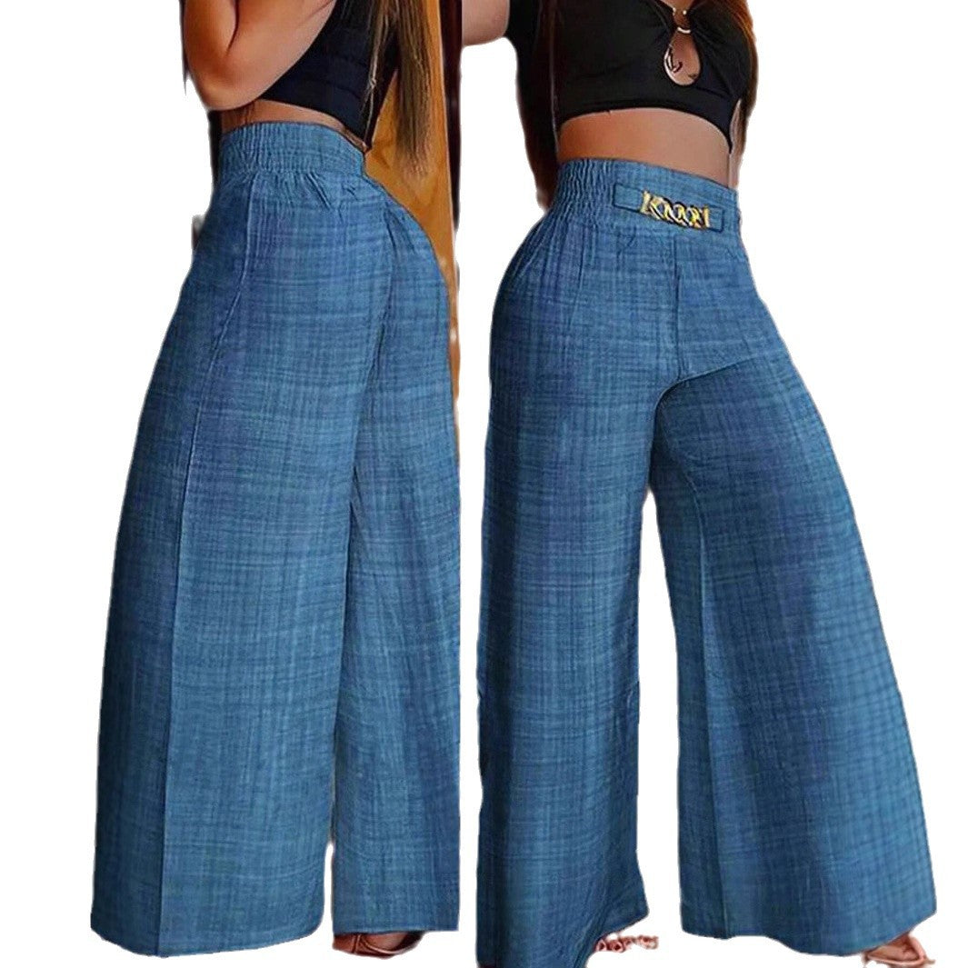 Trendige weite Damenhose mit elastischem Smokbund & auffälligem Kettendetail. Ideal für elegante Sommeroutfits.