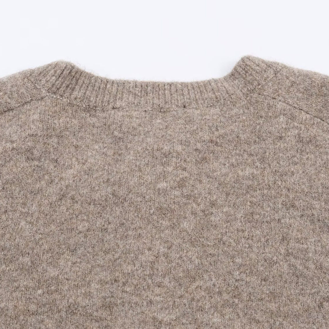 Modische Damen Cropped Strickjacke in Strickmode, vielseitig kombinierbar für jeden Anlass.