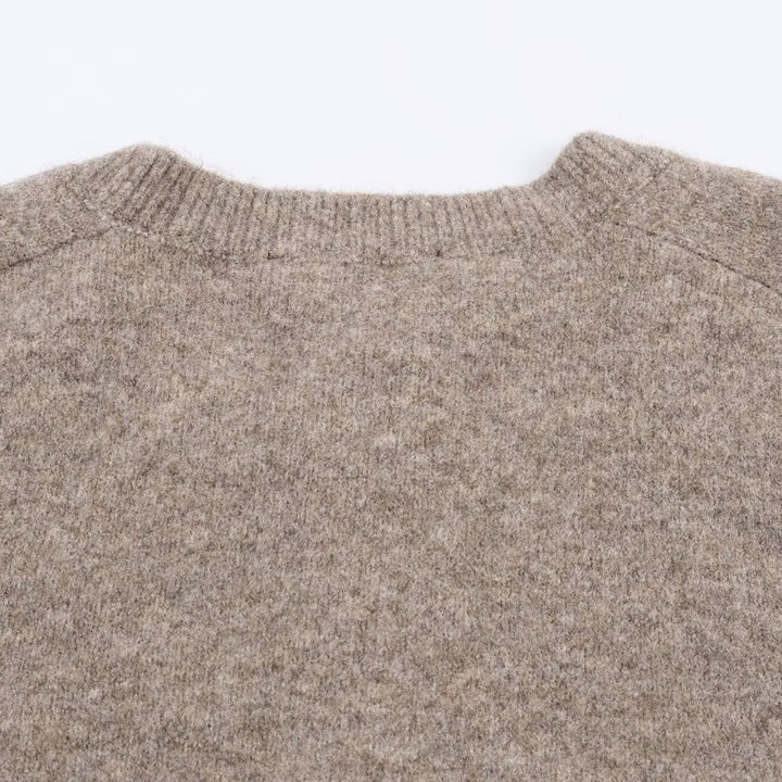 Modische Damen Cropped Strickjacke in Strickmode, vielseitig kombinierbar für jeden Anlass.