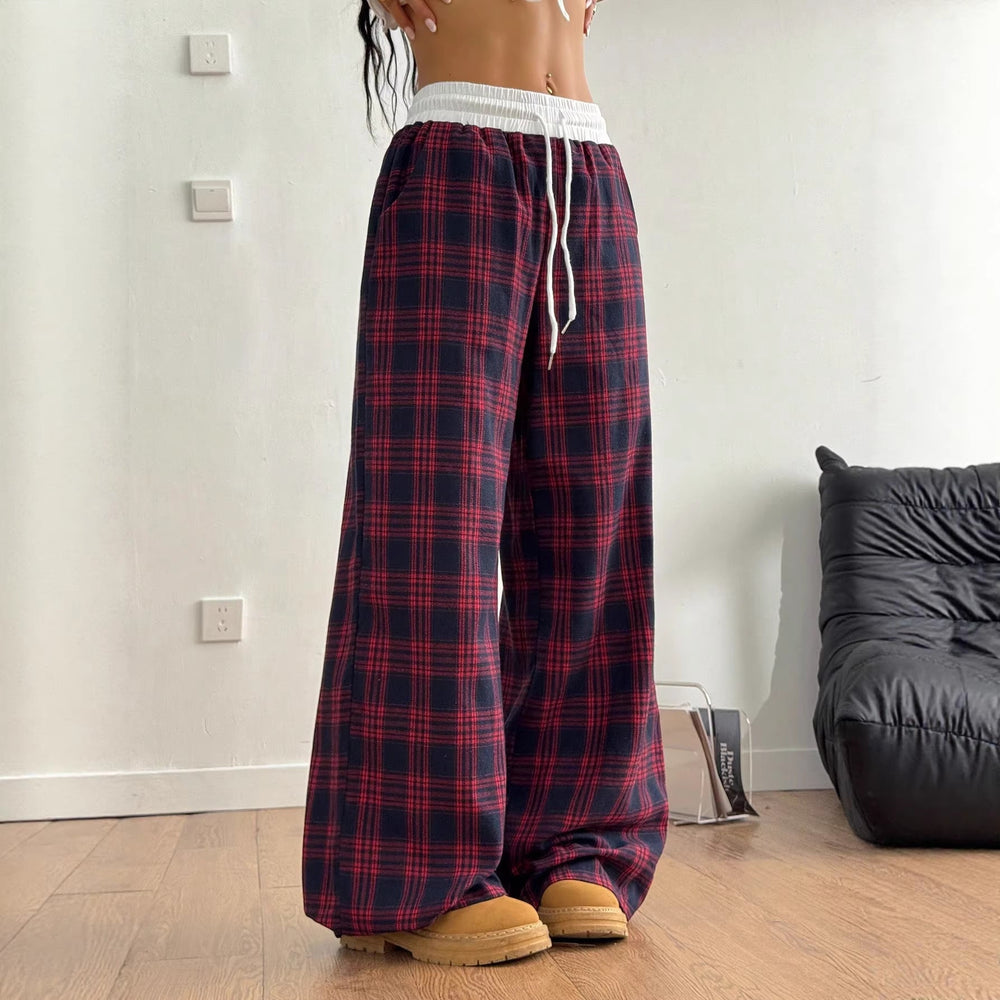 Komfortable Damen Lounge-Hose, weites Bein, kariertes Muster, hoher Bund. Ideal für entspannte Tage.
