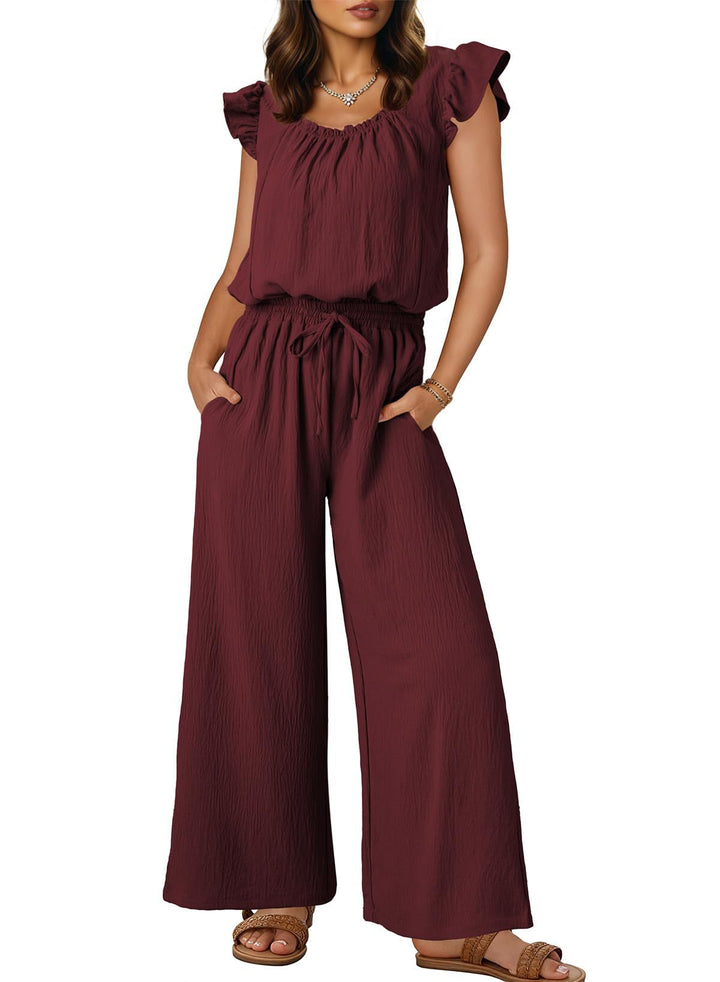 Vielseitiger Damen Sommeroverall mit weitem Bein & Rüschenärmeln, aus leichtem, knitterarmem Crinkle-Stoff.