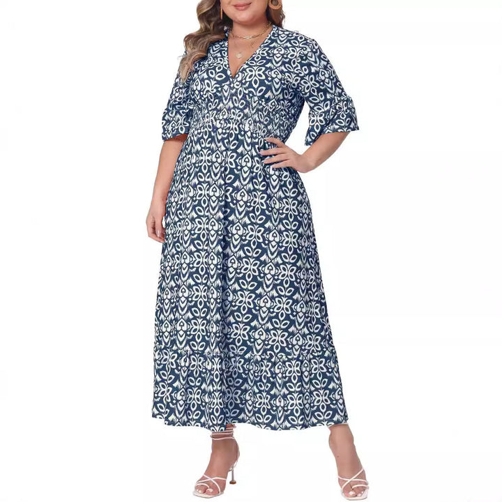 Raffierte Taille am Damen Midikleid in A-Linie. Komfortables Sommerkleid mit stilvollem Grafikmuster.