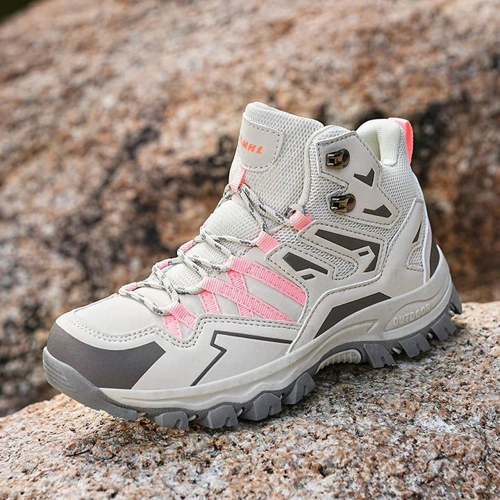 Schwarze Damen Wanderschuhe mit guter Traktion, wasserabweisend, ideal für nasse Pfade.