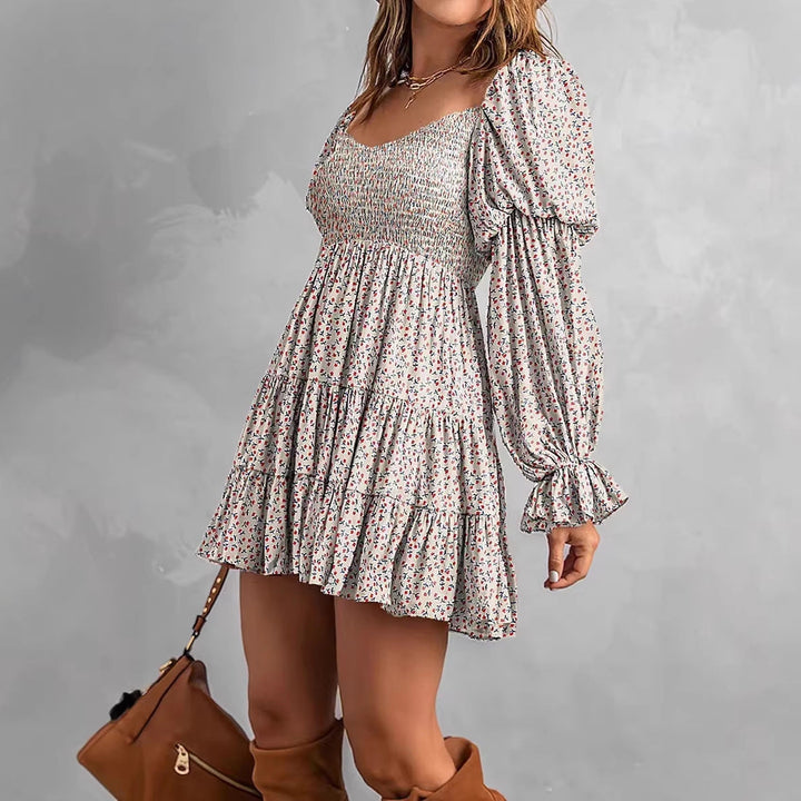 Luftiges Off-Shoulder Volantkleid für Frauen mit gesmoktem Oberteil und verspielten Rüschen. Ein Must-have im Sommer.