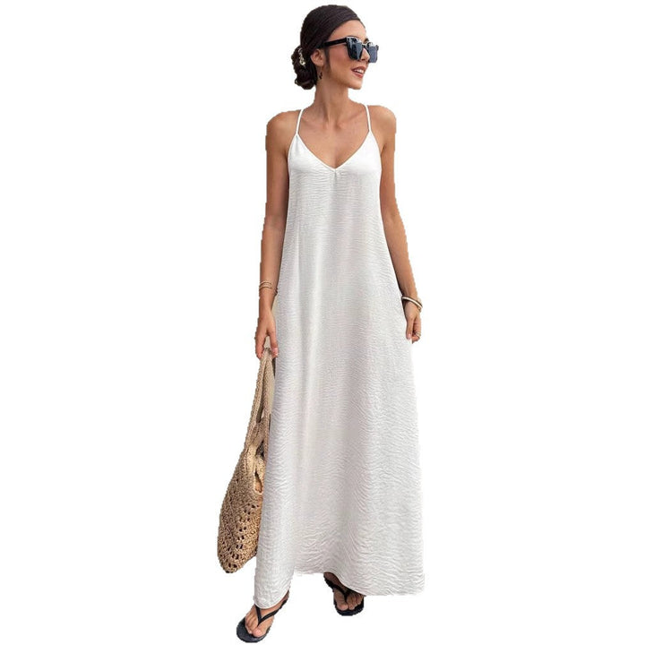 Luftiges Strand Maxikleid mit Spaghettiträgern und V-Ausschnitt, bequem für heiße Sommertage und Urlaub.
