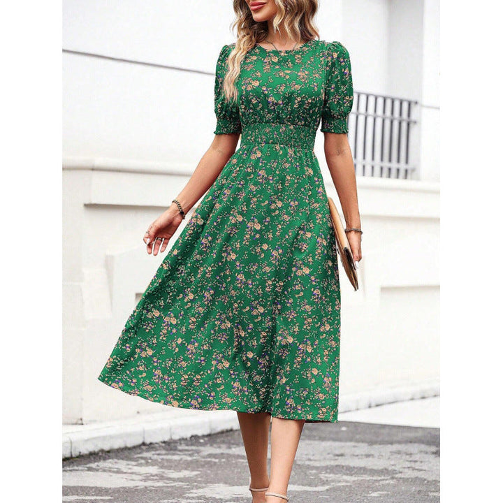 Modisches Damen Maxikleid mit floralem Druck, bequemer Smock-Taille und stylischen Puffärmeln.