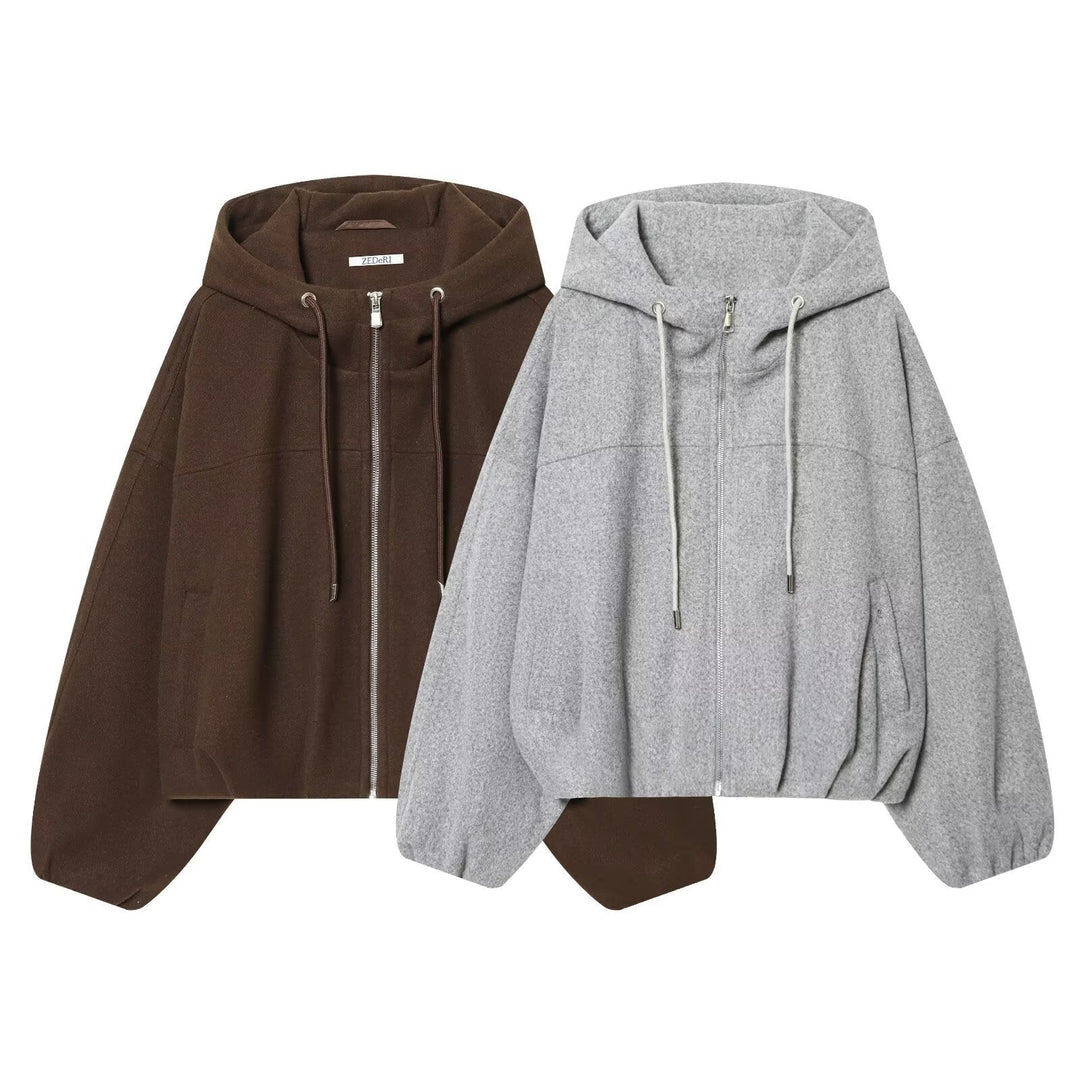 Modische Damen Kapuzenjacke in Schwarz, locker geschnitten für casual Stil & Komfort im Alltag.