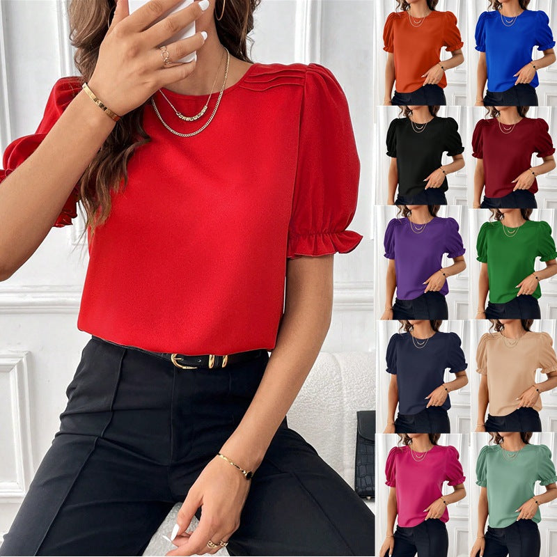 Elegante Damenbluse mit modischen Puffärmeln & dekorativen Schulterfalten, vielseitig für Büro & Freizeit.