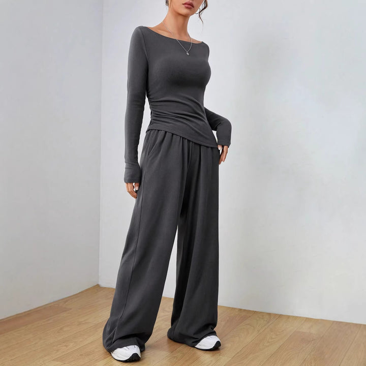 Elegantes Damen Freizeitanzug Set mit U-Boot-Ausschnitt und weiter Palazzo Hose für Homewear.