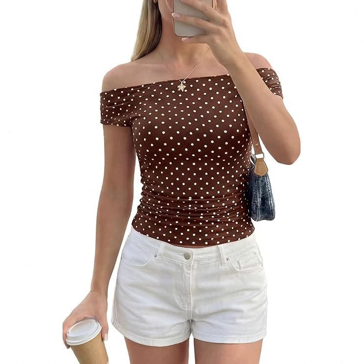 Figurbetontes schulterfreies Polka-Dot Damen Top, tailliert geschnitten, ideal für elegante Anlässe.