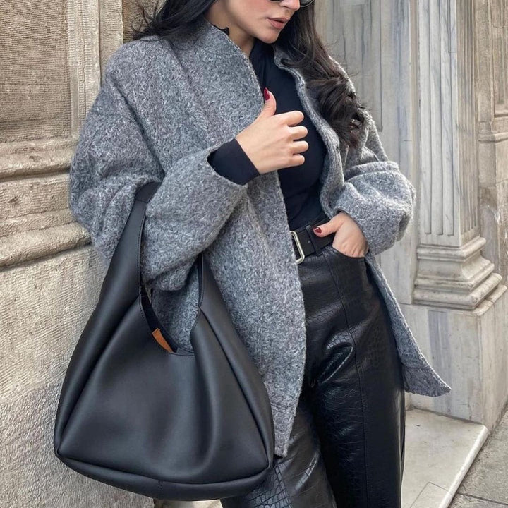 Graue, kuschelige & elegante Damen-Übergangsjacke für Komfort & Stil im Alltag.